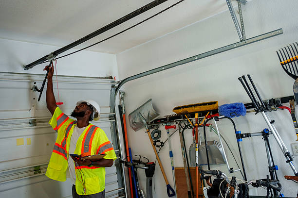 Professional Garage Door Panel Replacement technician working in Montana City, MT